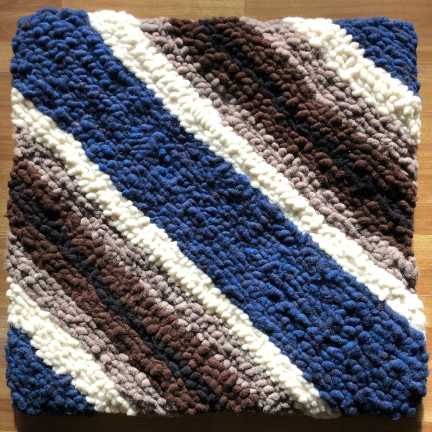 A mutli-colored saddle pad.